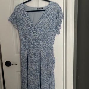Pretty garden floral wrap dress. Beautiful blue color with wrap style